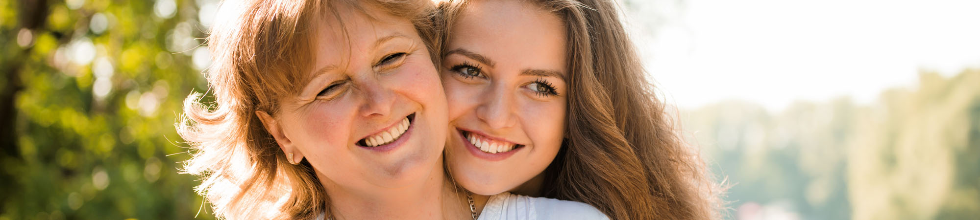 Smiling Mother and Daughter